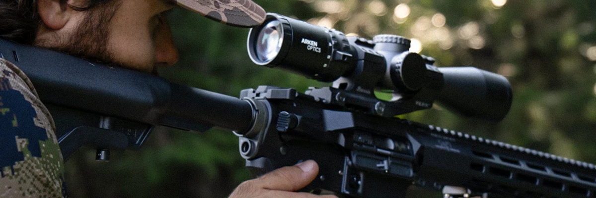 Rifle fitted with a scope for outdoor shooting