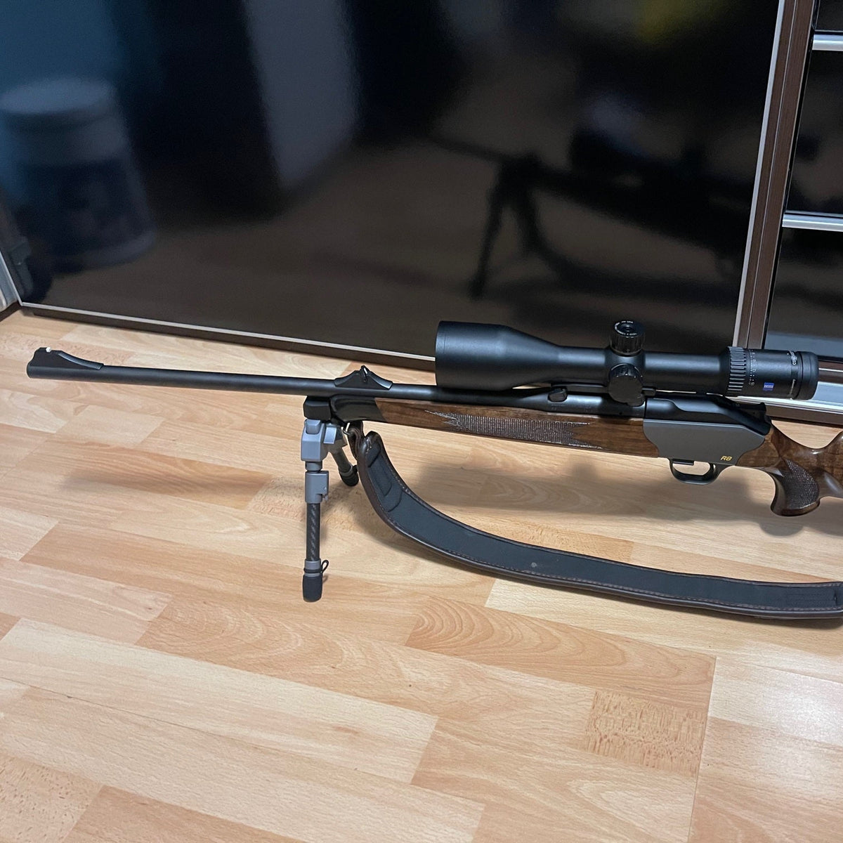 Blaser R8 rifle with Spartan Javelin bipod attached using Salamander Tactical adapter