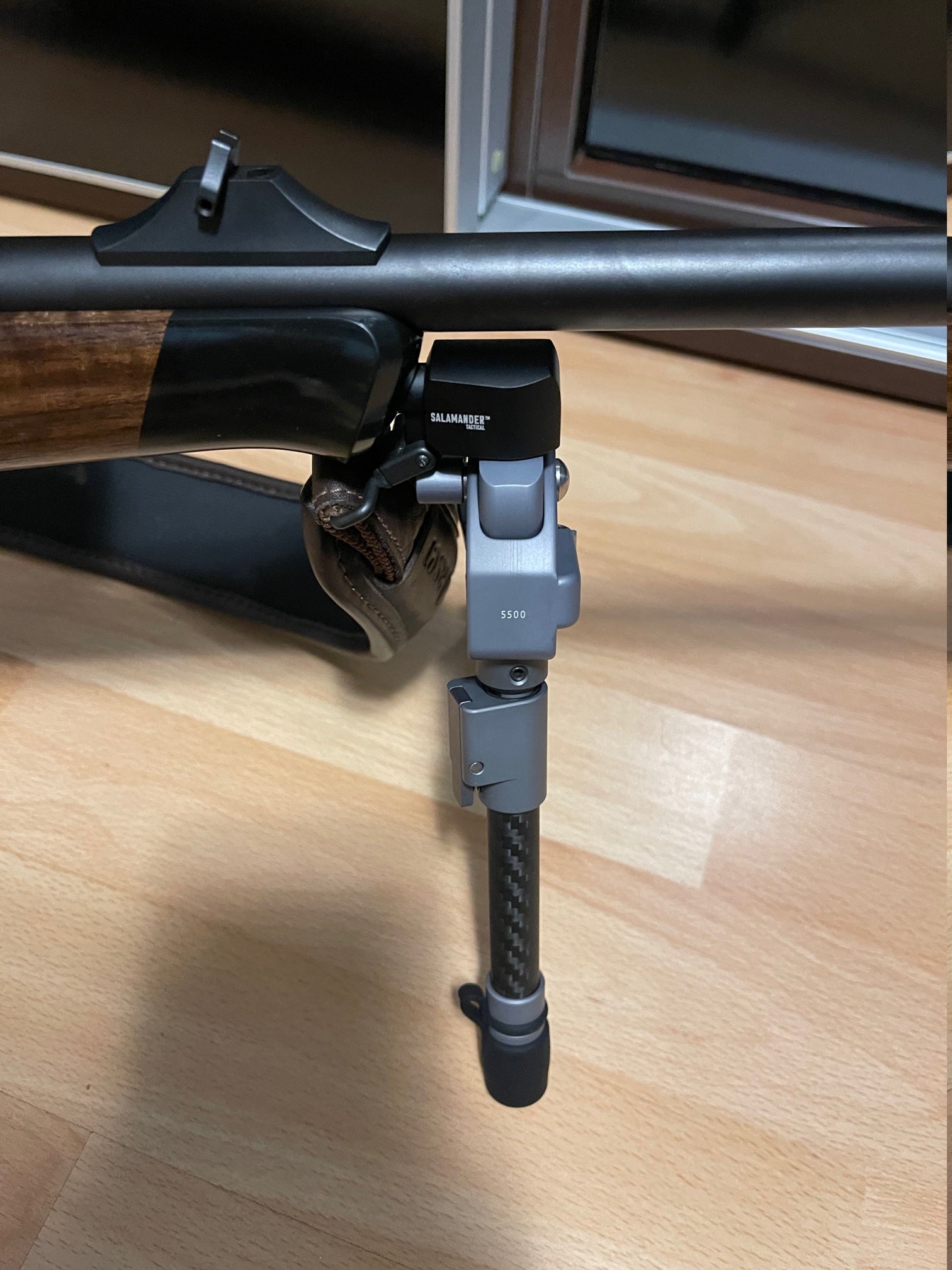 Blaser R8 Professional Adapter for Spartan Javelin bipods mounted on rifle showing detailed configuration.