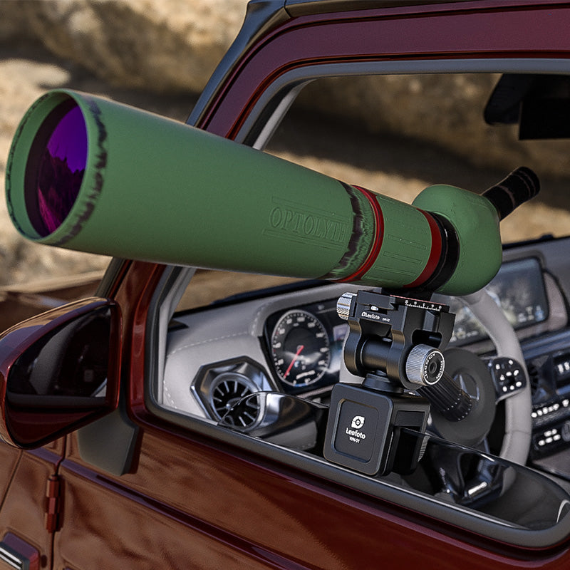WN-01+SW-02 car window clamp kits with scope mounted in vehicle for stable shooting platform.