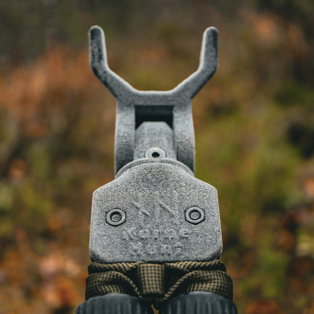Close-up of the V-cradle and polymer head on NorneHunt shooting sticks.