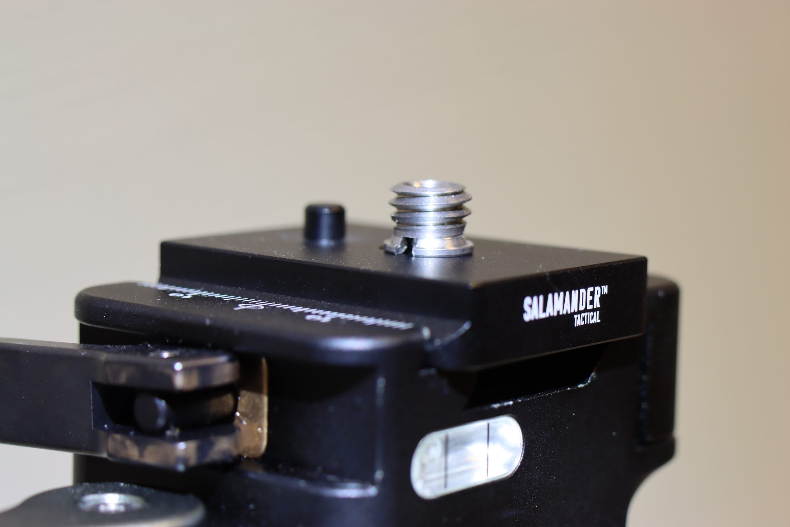 Arcaplate with anti rotation pin for spotting scope mounted on a tripod.