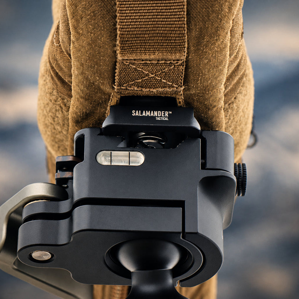 Arca spotting scope plate mounted in Arca-compatible clamp