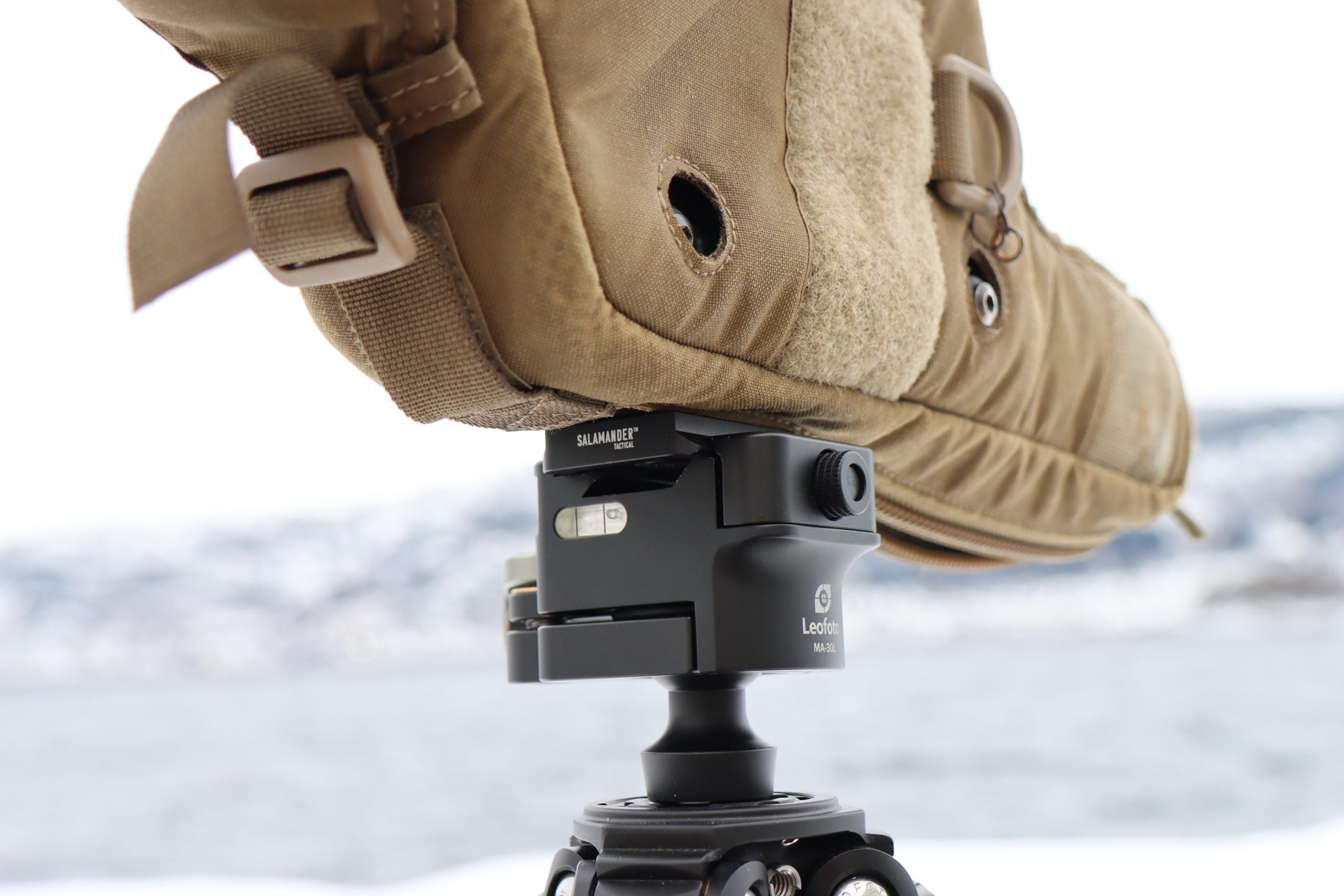 Arcaplate with anti rotation pin for spotting scope mounted securely on a tripod.