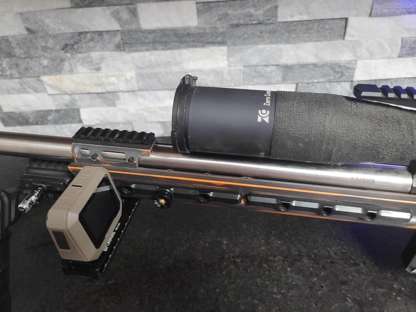 Arca Rail for Garmin Xero C1 Pro - NR-140D mounted on rifle for stable positioning.